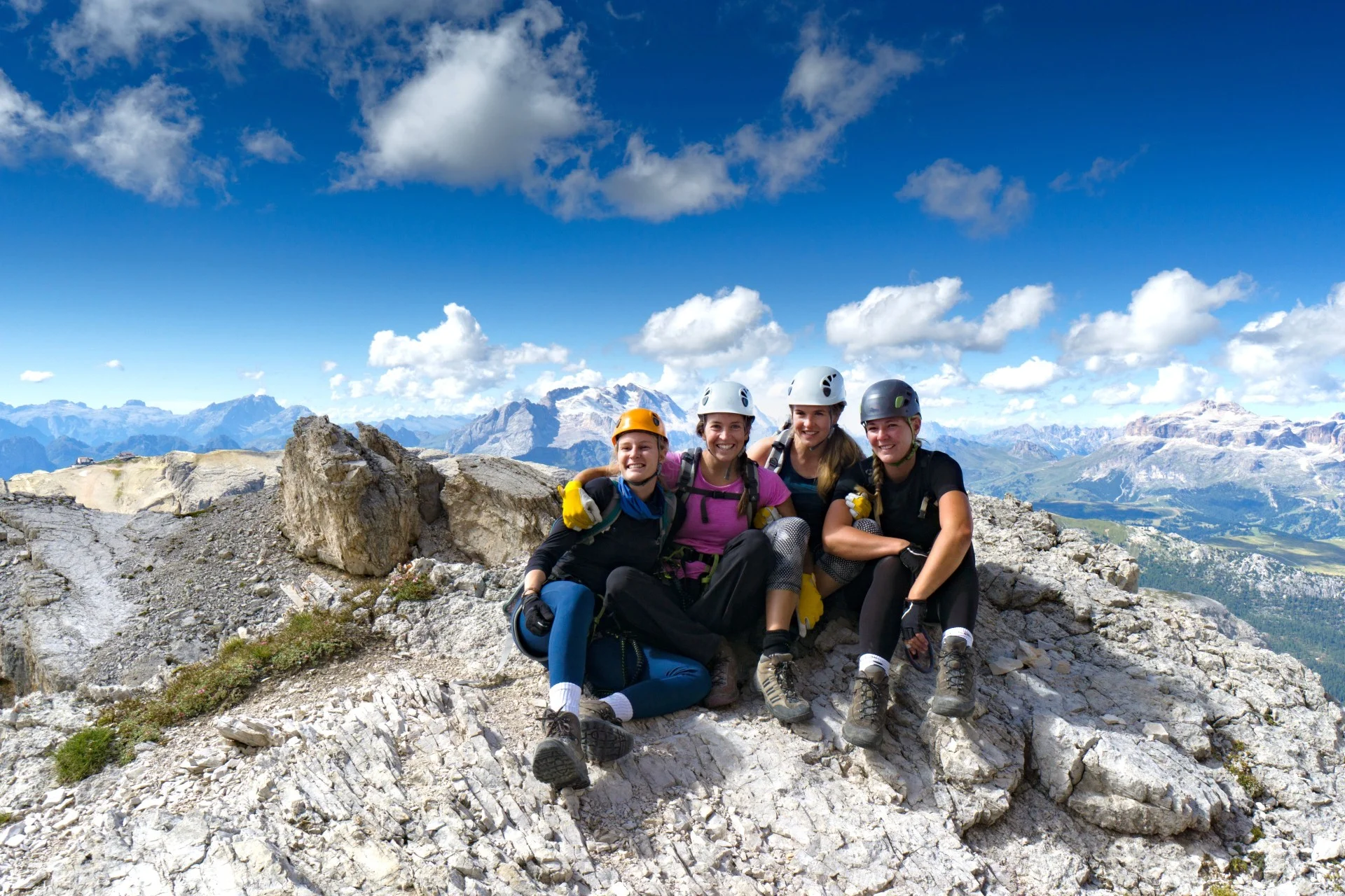 Group at the summit after climbing a via ferrata