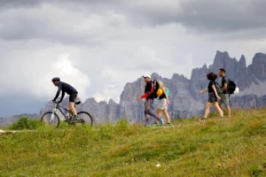 Hikers and a cyclist at Croda da Lago - Cortina d'Ampezzo.