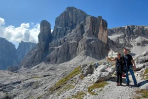 Hikers near Tridentina via ferrata summit.