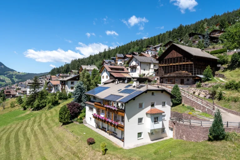 Ortisei Village and alpine houses in Val Gardena.