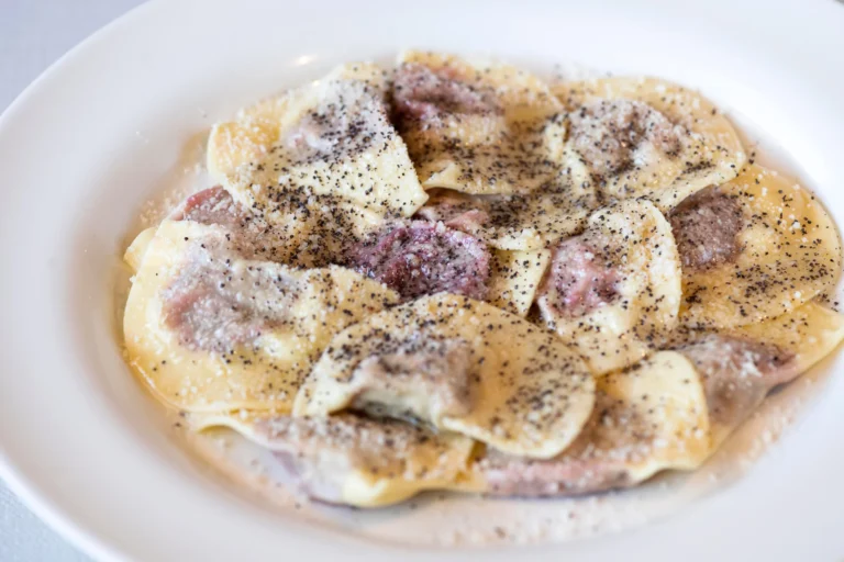 South Tyrol food - Casunziei all'ampezzana, pasta typically ravioli with beetroot filling.