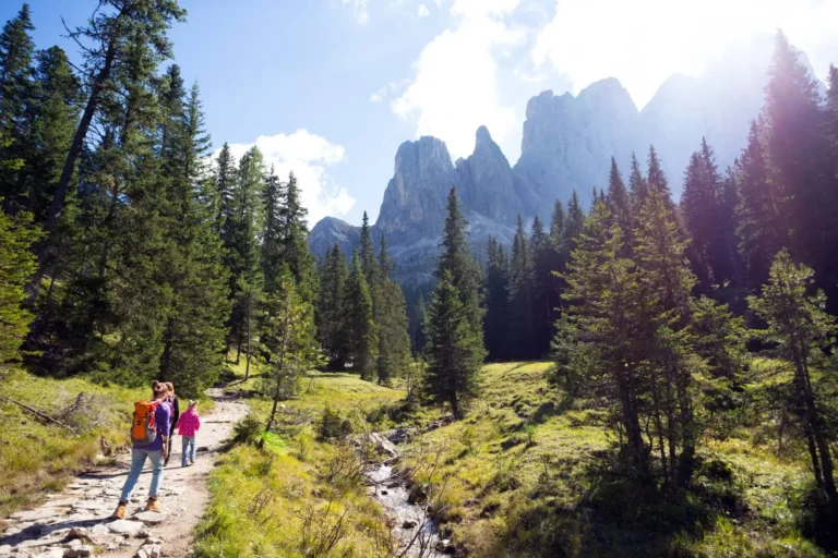 Hiking alongside a stream at Puez-Odle: