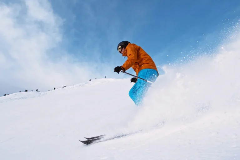 Skier creating snow spray.