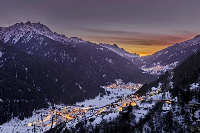 Val di Sole towns by night in winter.