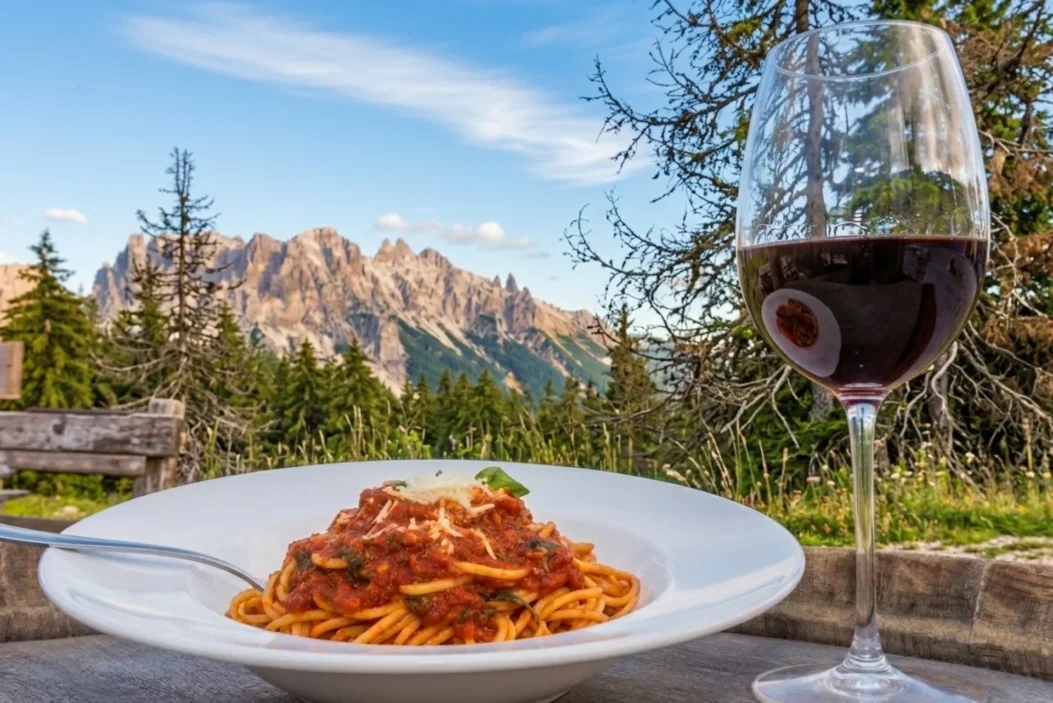 Pasta and wine at a rifugio in the Dolomites.
